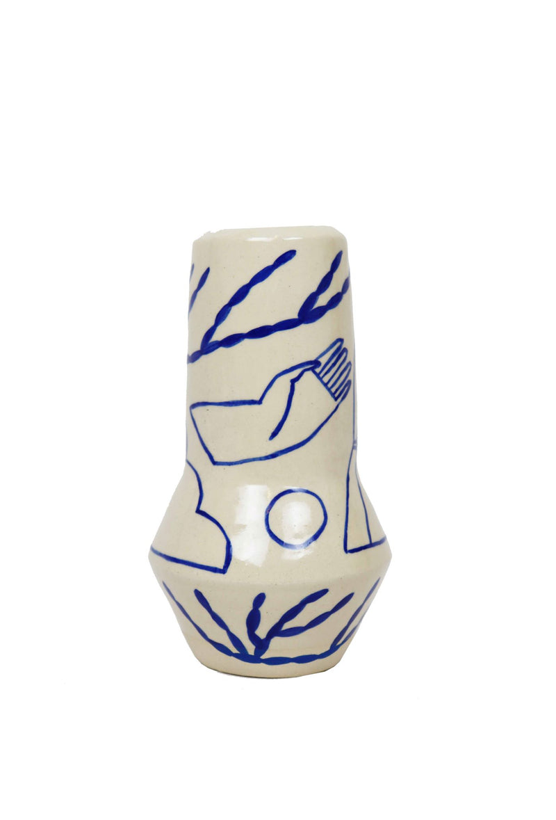 Detail of hand from this handmade ceramic flower vase by Sophie Alda in her London pottery studio