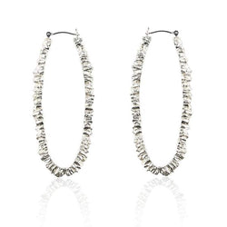 solid silver long oval textured hoop earrings by niza huang available at cuemars.com