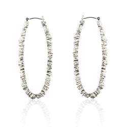 solid silver long oval textured hoop earrings by niza huang available at cuemars.com