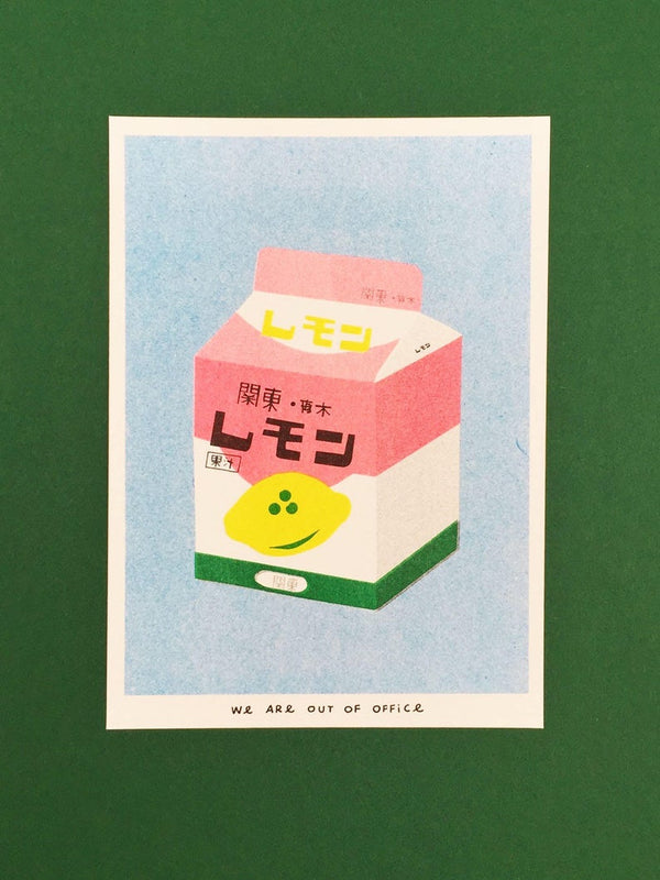 Vibrant carton of Japanese lemon milk in a pastel blue background. Designed and printed by Dutch company We Are Out of Office.